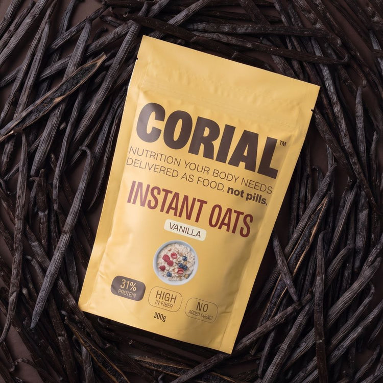 Embalagem CORIAL Instant Oats Baunilha sobre vagens de baunilha